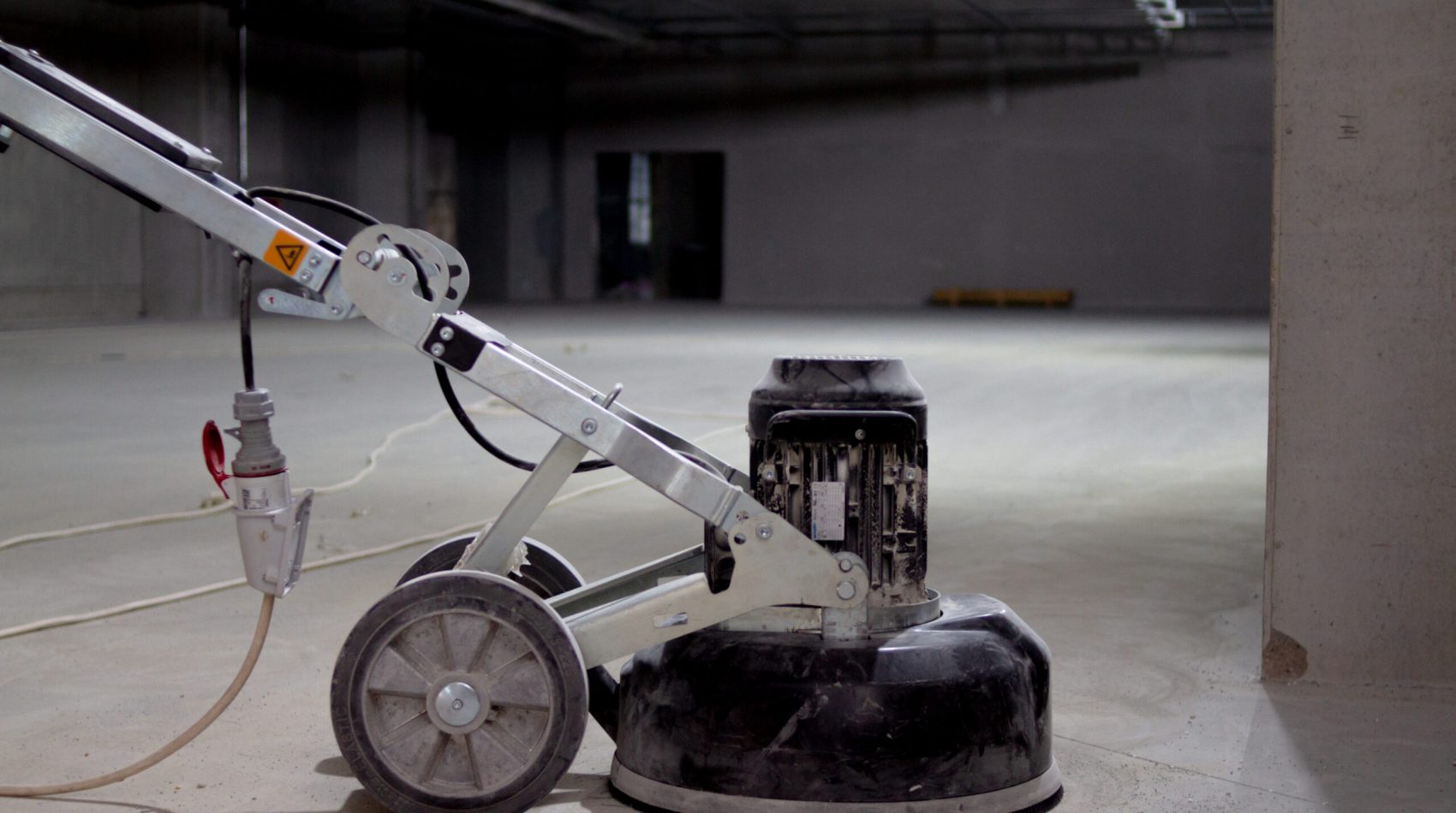 concrete floor grinding machine is an essential tool used to pre concrete floor grinding machine is an essential tool used to prepare the surface of a concrete floor before the installation of a new layer. Its powerful motor and diamond-tipped grinding discs are effective in removing unevenness and smoothing out imperfections in the concrete